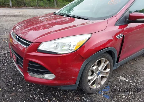 2013 Ford Escape Sel z USA, uszkodzony, nr VIN 1FMCU0HX4DUD68100